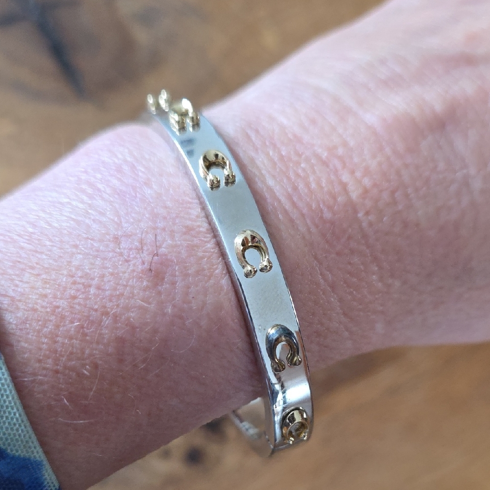 Coach Silver Bracelet with Gold Horseshoe Accents